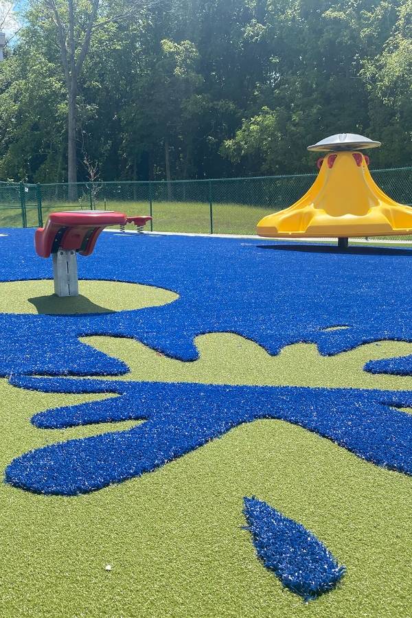 Playground laid with artificial grass