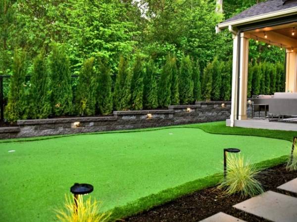 Artificial grass near the gazebo in the park