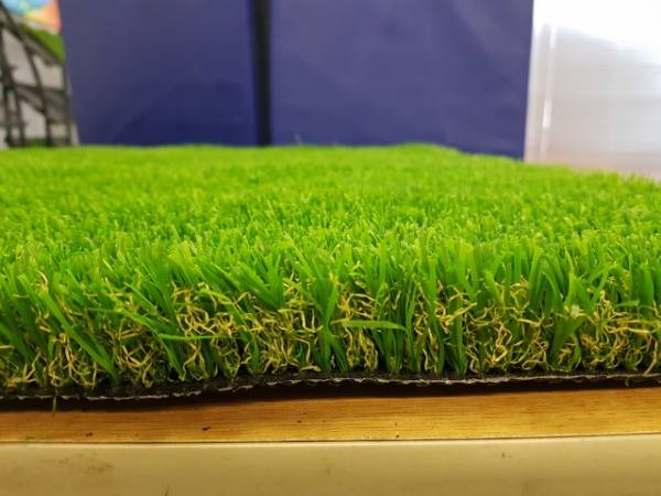 PE artificial grass on the desk