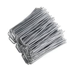 Many galvanized U-shape nails
