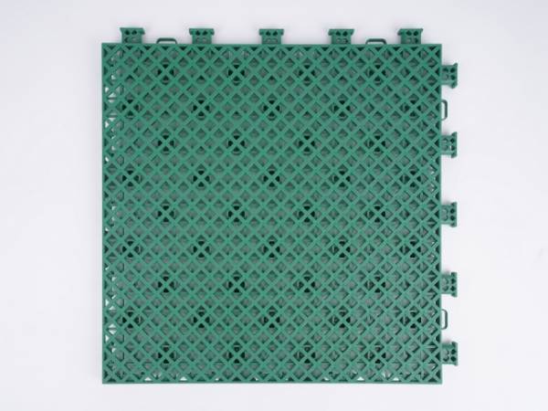 A green type-2 interlocking sports flooring tile