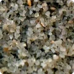 A pile of silica sand infill